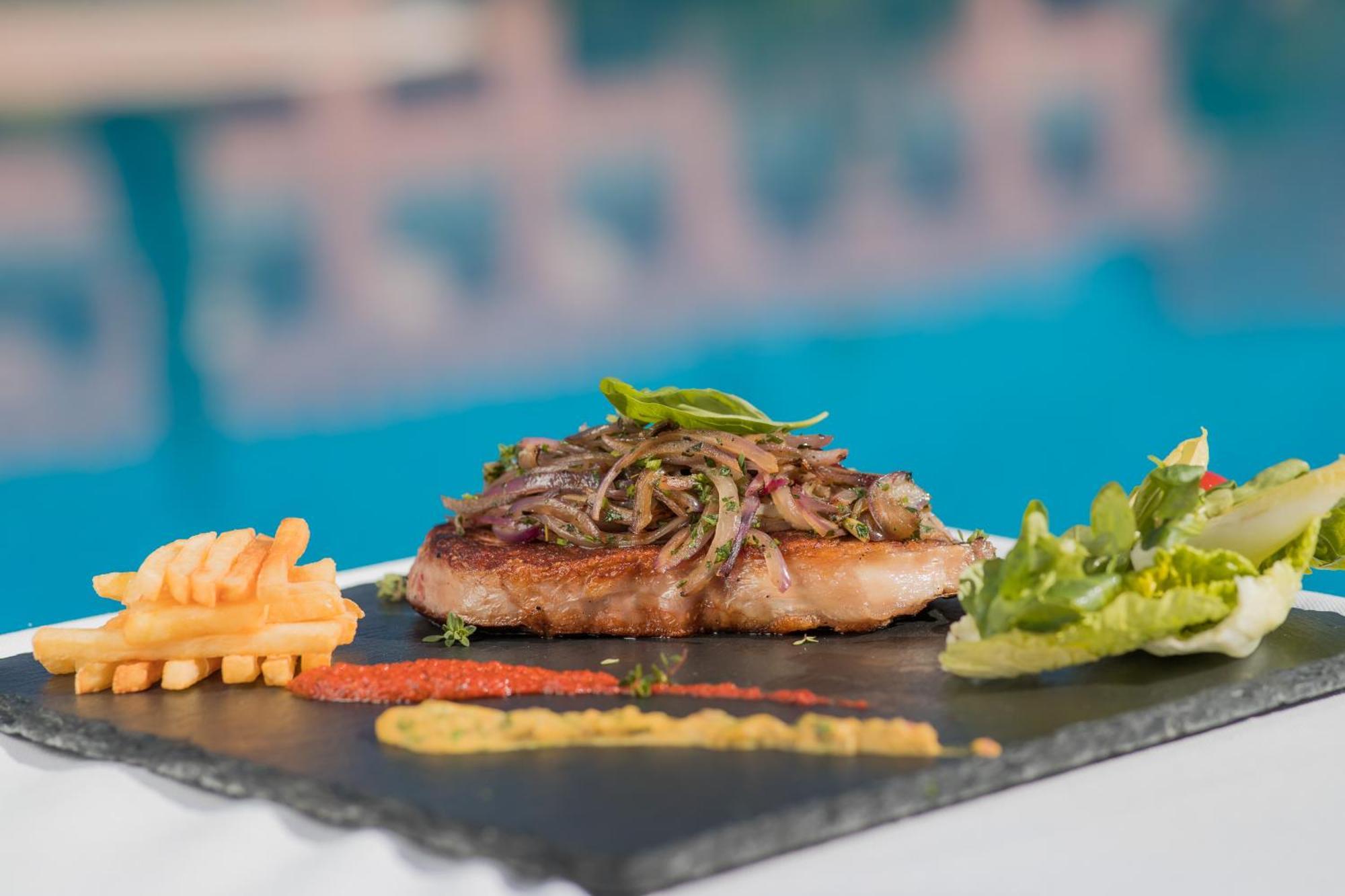 Grand Mogador Agdal & Spa Marrakesh Exteriör bild A steak prepared with the method of cooking